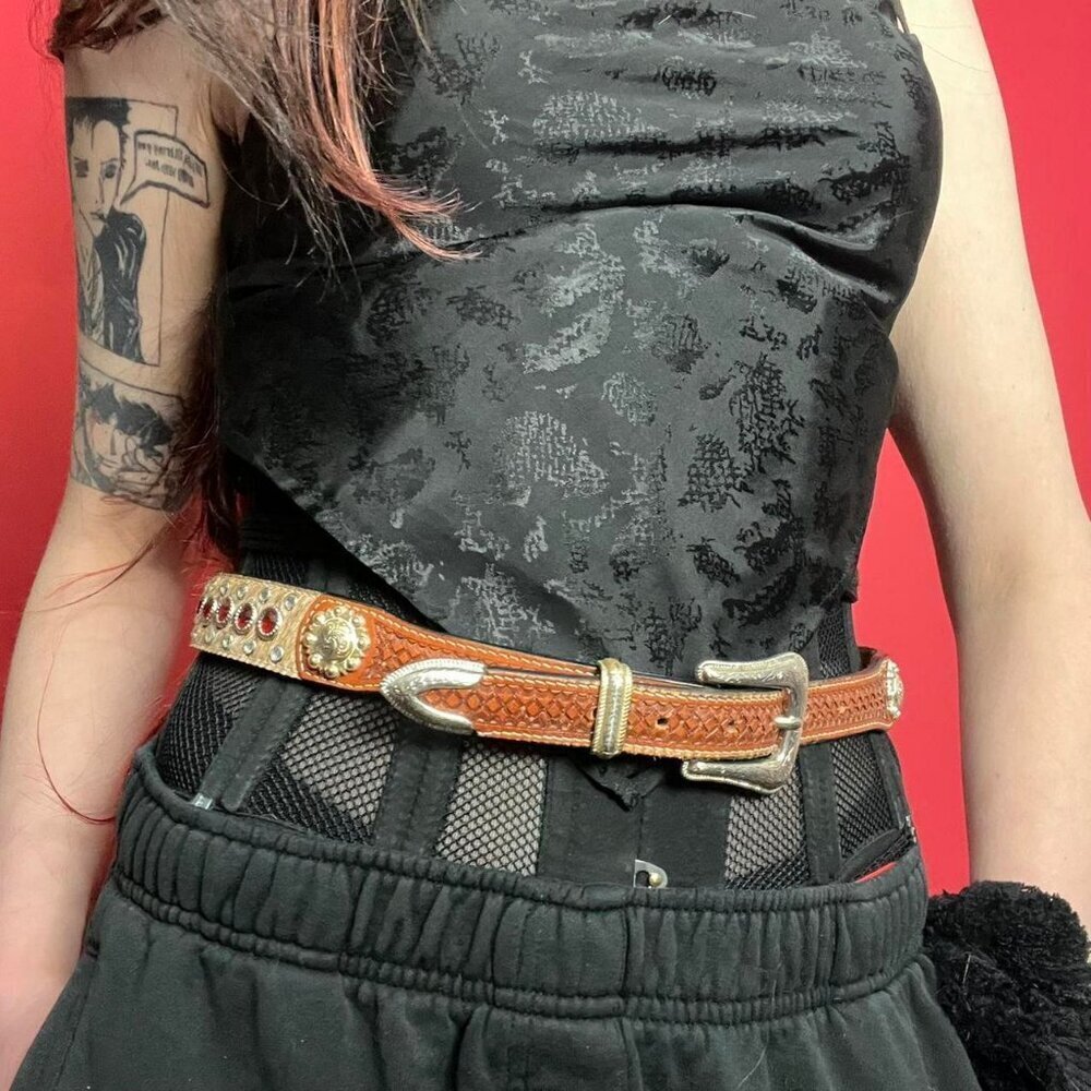 Brown leather cowgirl belt with red gemstones​​​